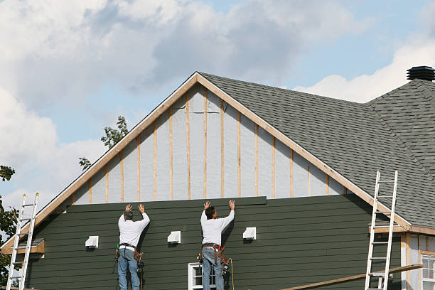 Professional Siding technician working in Burlington, NC